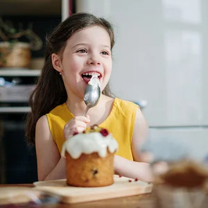 child eating sweets